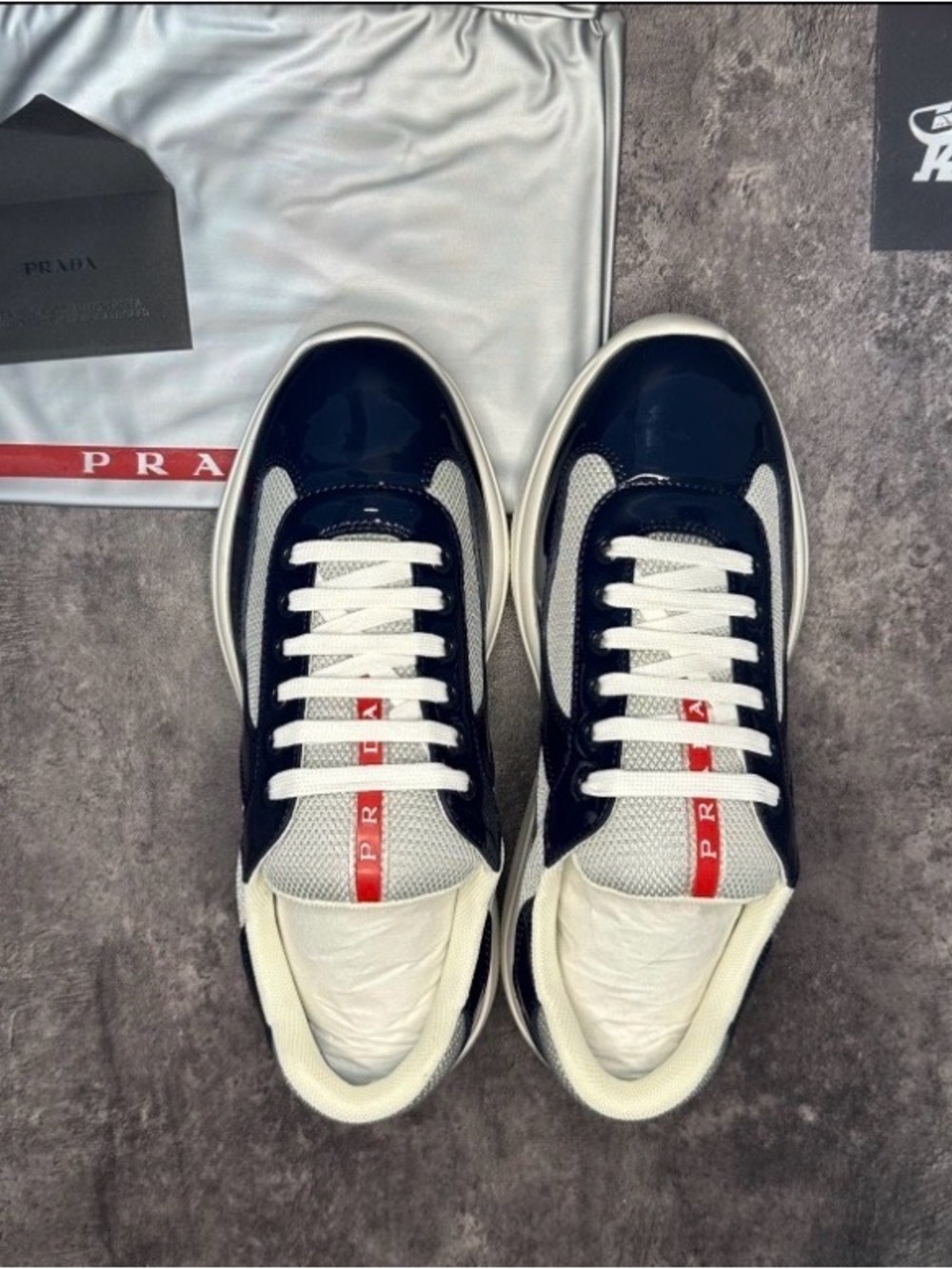 Prada Navy, White & Red Low-Top Sneakers